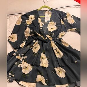 Ballon sleeve, deep v cocktail dress. Deep emerald/teal color with white flowers